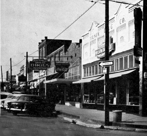 Main street, 1954. Wilson, later McClure, Drugs and Montevallo Drugs were next door neighbors for years until a fire forced Montevallo Drugs to move into the new Whaley Shopping Center in the early 1960's.