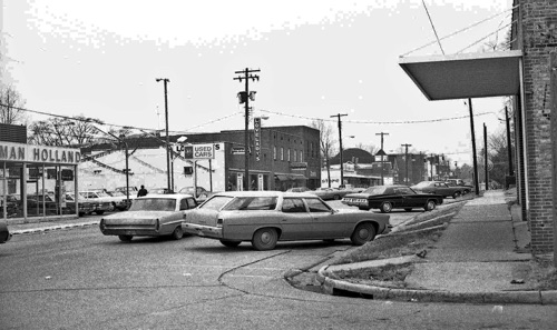 A view of Main Street from 1972 across from Sherman Holland Ford. The building on the right is the Barnes & Noble bookstore today.