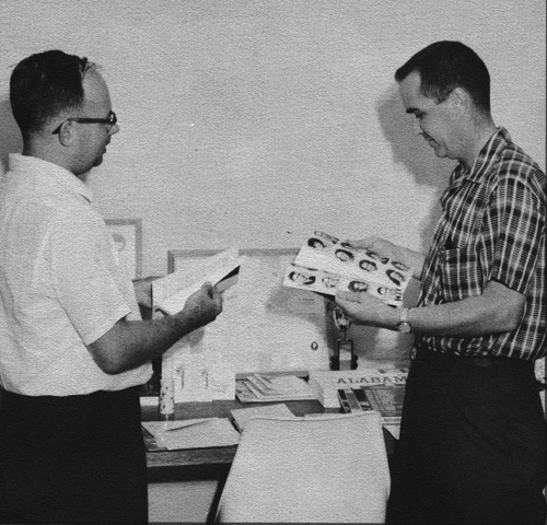 Pat Wyatt and his friend Bill Weston look over Montevallo High School yearbook proofs.